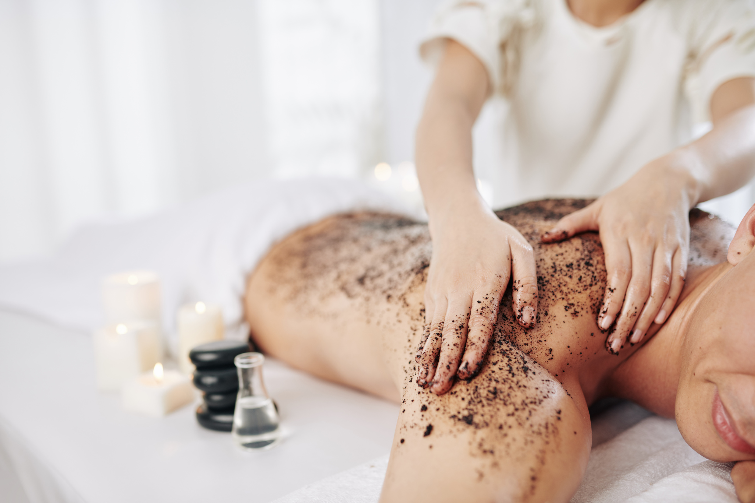 Massaging Back with Coffee Scrub